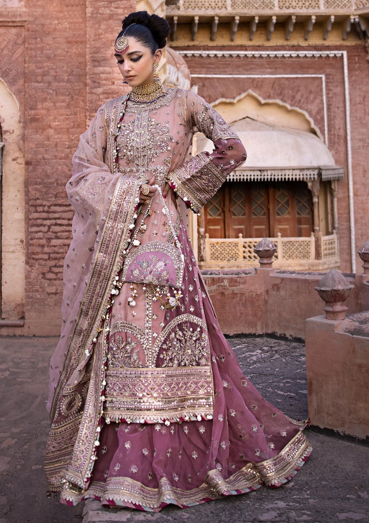 Wedding Wear Mauve Color Velvet Base Heavy Work Lehenga Choli